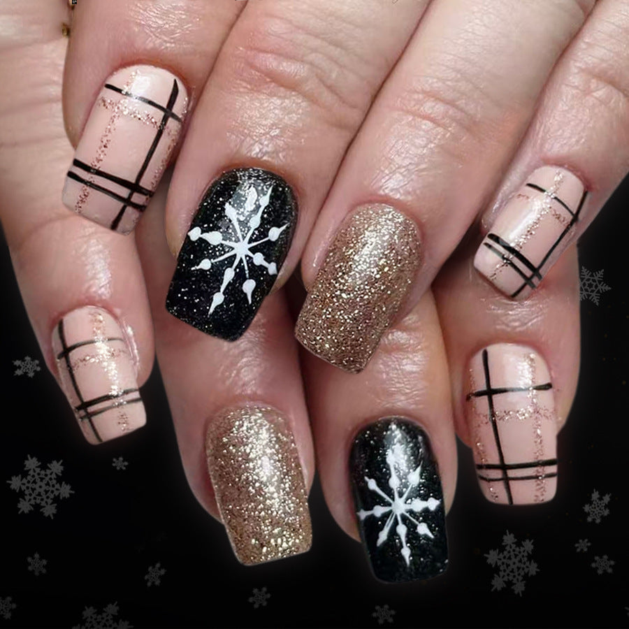 Winter Wonderland Elegant Medium Square Press-On Nail Set in Soft Pink Black and Gold with Snowflake Design
