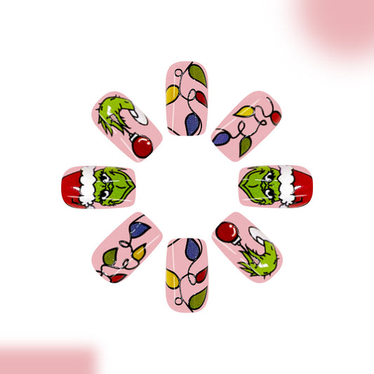Whimsical Holiday Cheer Press on Nail Set in Long Square Pink with Grinch and Christmas Light Designs