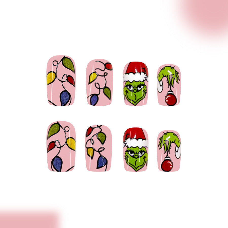 Grinch Inspired Festive Press On Nail Set Long Square Pink Color with Whimsical Holiday Decorations
