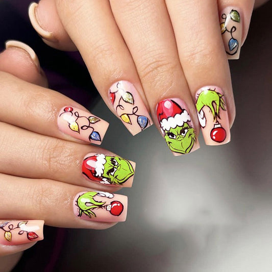 Whimsical Grinch Inspired Long Square Green and Red Festive Nail Set with Glittering Holiday Lights