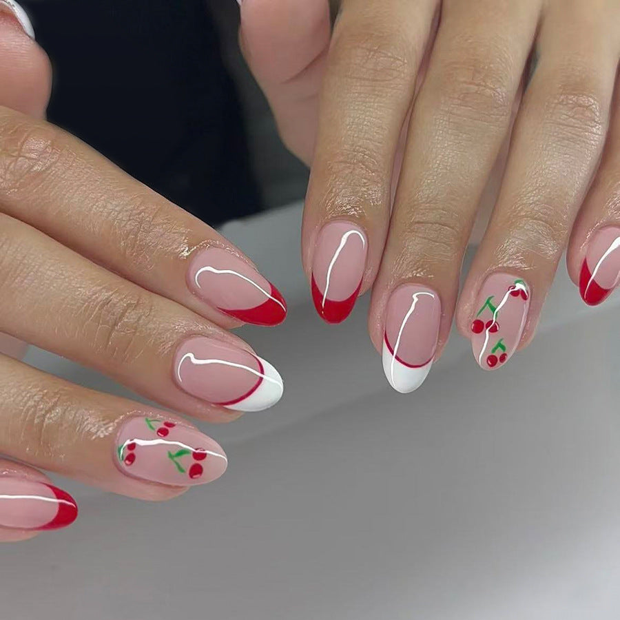 Cherry Blossom Delight Elegant Short Oval Shaped Red and White Gradient Press on Nail Set with Charming Cherry Accents