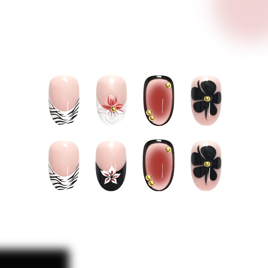 Elegant Floral Dream Medium Oval Pink and Black Press On Nail Set with Unique Gemstone Accents