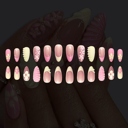 Whimsical Blossom Dream Long Almond Pink and Cream Floral Press On Nail Set with Unique Shell Designs