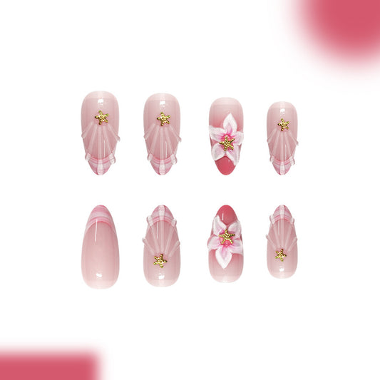 Floral Elegance Long Almond Shaped Soft Pink with Delicate Flower Accents Nail Set