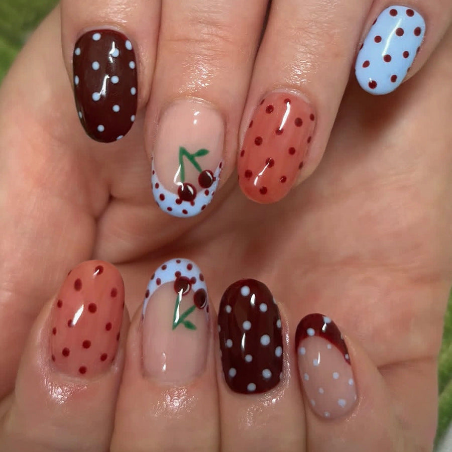 Cherry Blossom Delight Stylish Short Oval Blue and Brown Polka Dot Press On Nail Set with Charming Cherry Design