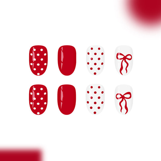 Festive Charm Red Short Oval Press On Nail Set with Polka Dots and Bow Design
