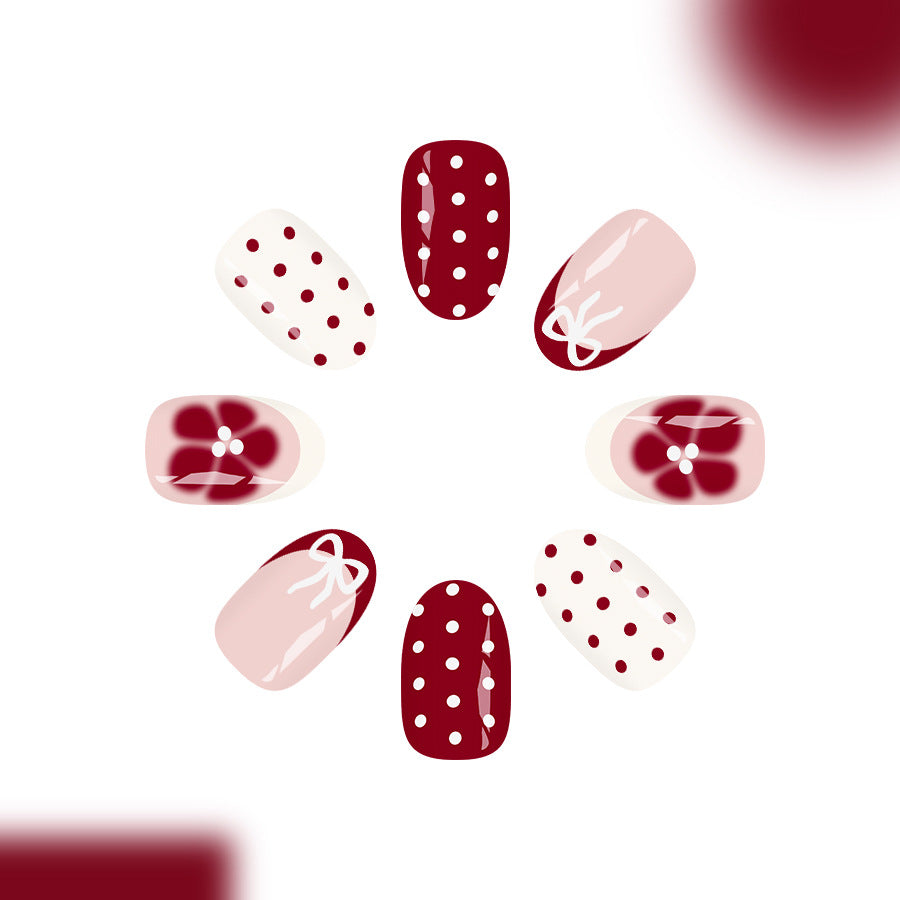 Chic Floral Romance Medium Oval Burgundy and Blush Nail Set with Charming Dot and Bow Accents