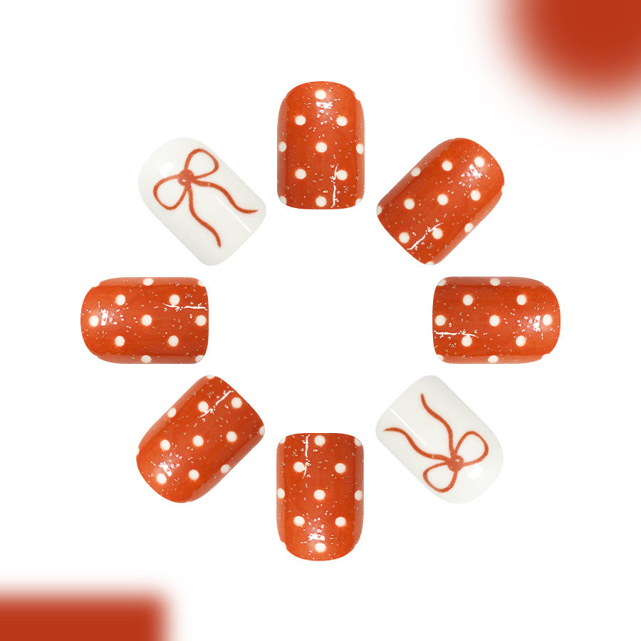 Festive Elegance Short Square Orange with Polka Dots and Charming Bow Design Press On Nail Set