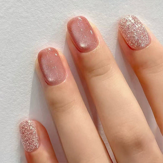 Glistening Dreamy Pink Short Square Nails with Sparkling Accents and Glossy Finish