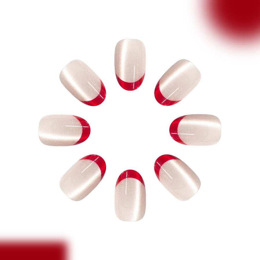 Glamorous Champagne Elegance Short Oval Shaped Glossy Off White with Bold Red Tips Nail Set