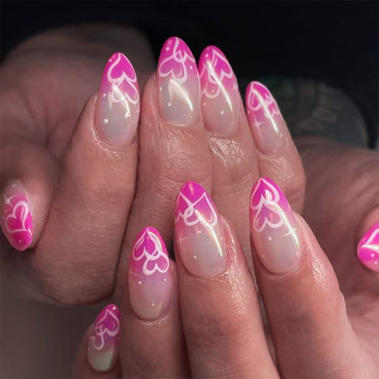 Romantic Heart Inspired Long Almond Shaped Pink Ombre Nail Set with Delicate White Detail