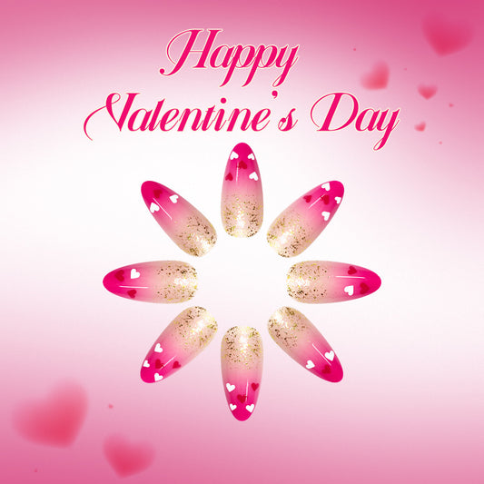 Romantic Dreamy Long Almond Shaped Ombre Pink Press On Nail Set with Charming Heart Accents and Glitter Finish