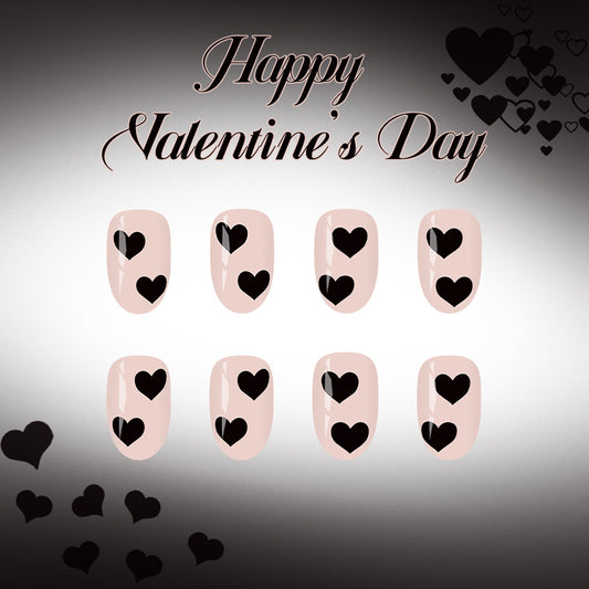 Romantic Heart Design Short Round Beige Press On Nail Set with Bold Black Heart Accents