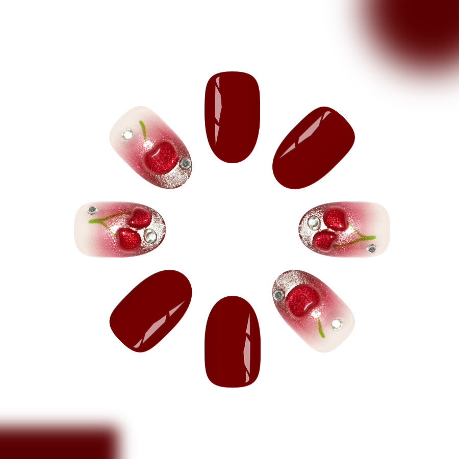 Cherry Blossom Delight Medium Oval Burgundy Nails with Sparkling Cherry Artwork