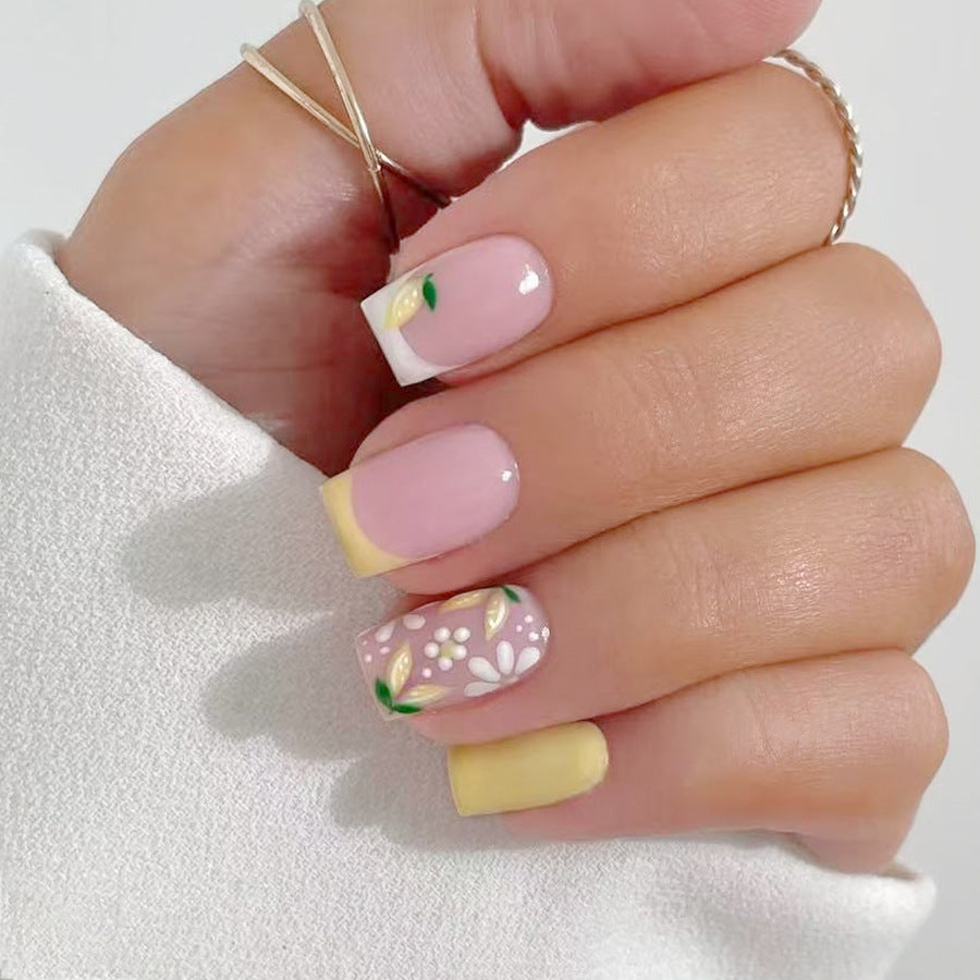 Sunshine Delight Short Square Press-On Nail Set in Pastel Pink with Floral Accents and Cheerful Yellow Tips