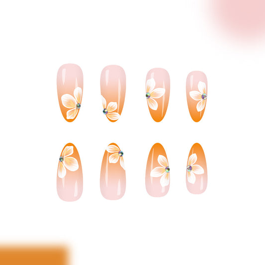Garden Blossom Charm Press-On Nail Set Long Almond Shaped Soft Pink and Orange Gradient with Floral Accents