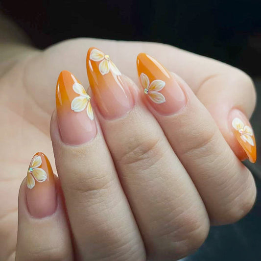 Floral Sunshine Long Almond Press on Nails with Elegant Flower Accents in Vibrant Orange and Clear Ombre Finish
