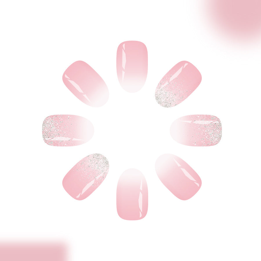 Whimsical Blossom Short Oval Soft Pink Press-On Nail Set with Sparkling Glitter Accent