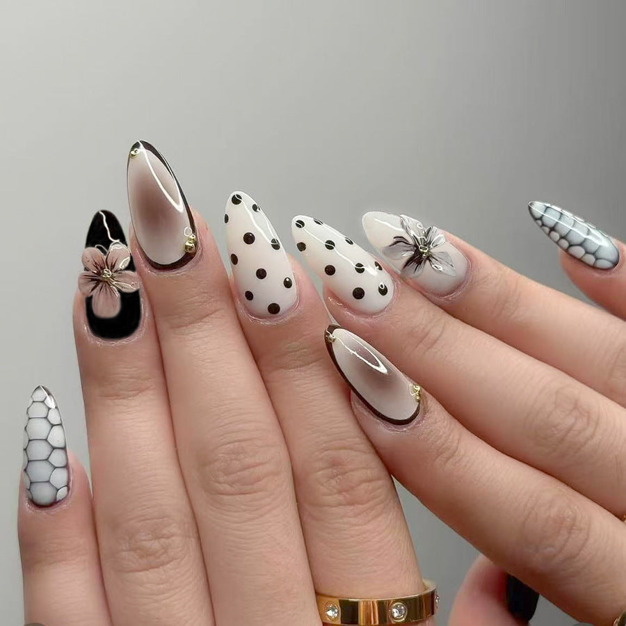 Chic Garden Elegance Long Almond Shaped White and Black Floral Press On Nail Set with Unique Gold Accents
