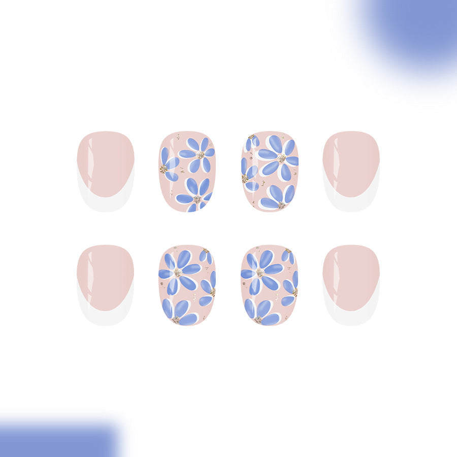 Floral Bliss Glossy Short Oval Press on Nail Set in Soft Pink with Delicate Blue Flower Accents