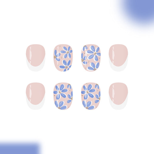 Floral Bliss Glossy Short Oval Press on Nail Set in Soft Pink with Delicate Blue Flower Accents