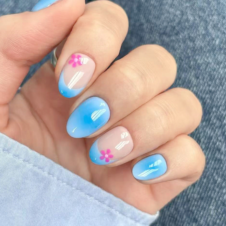 Whimsical Ocean Breeze Short Oval Light Blue with Charming Floral Accents Press-On Nail Set