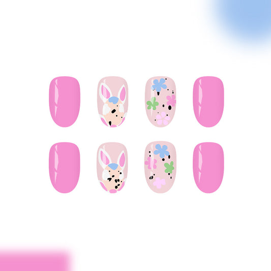 Whimsical Garden Dream Medium Oval Pink Nail Set with Playful Floral and Bunny Designs