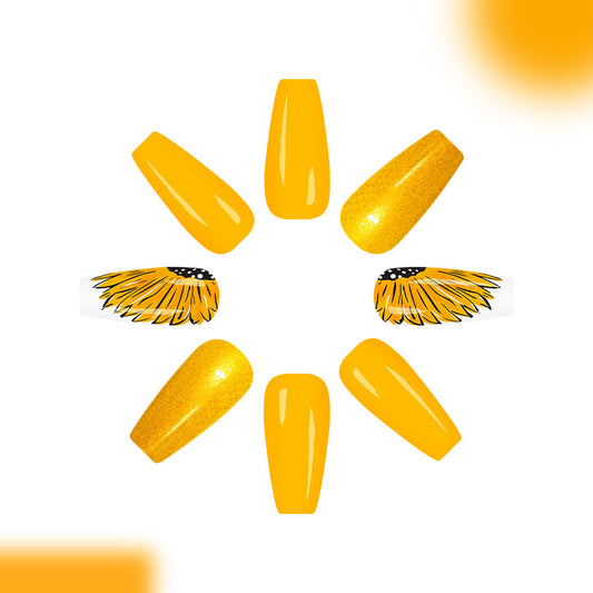 Sunshine Delight Long Coffin Yellow Nail Set with Sparkling Glitter and Artistic Wing Design