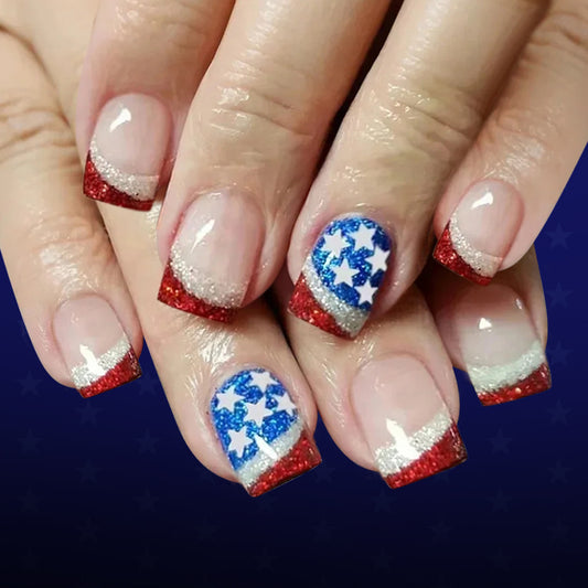 Star-spangled short square press-on nail set in vibrant red white and blue with eye-catching glitter accents