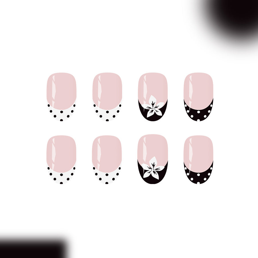 Elegant Floral Black and Pink Medium Round Nail Set with Charming Polka Dot and Flower Design