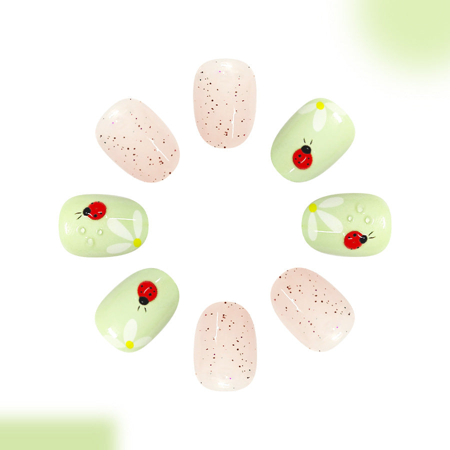 Whimsical Garden Short Round Pastel Nail Set with Ladybug Design