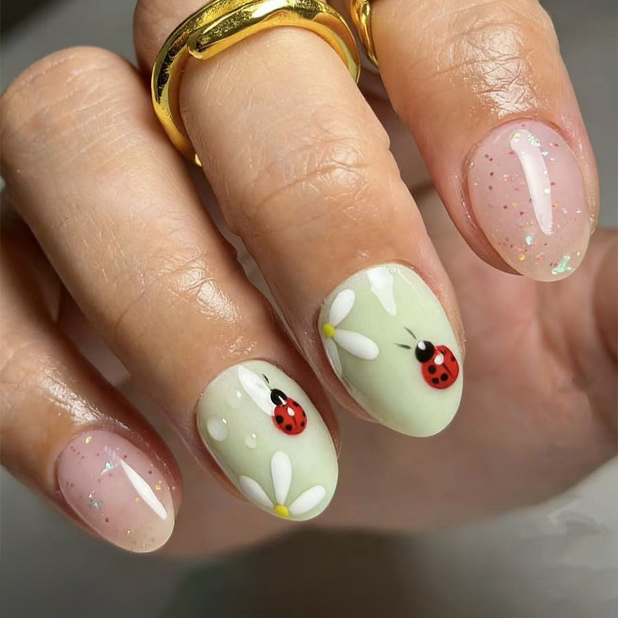 Whimsical Garden Inspired Short Oval Green with Ladybug and Daisy Accents Press on Nail Set
