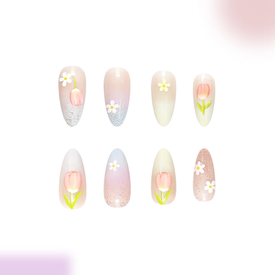 Whimsical Floral Press On Nail Set in Medium Stiletto Pink Gradient with Charming Flower Accents