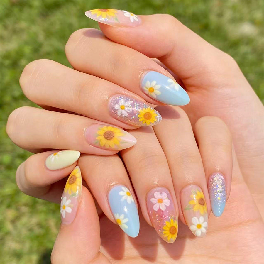 Bright Floral Fantasy Medium Almond Sky Blue with Unique Flower Accents Press On Nail Set