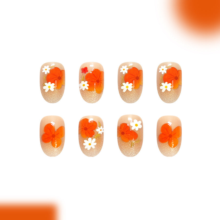Floral Breeze Short Oval Orange Gradient Nail Set with Flower Accents