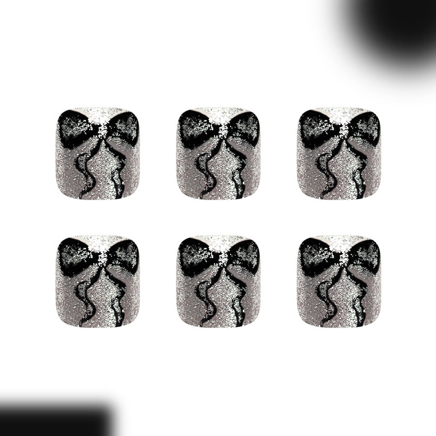 Elegant Silver Sparkle Short Square Press-On Toenail Set with Unique Bow Design