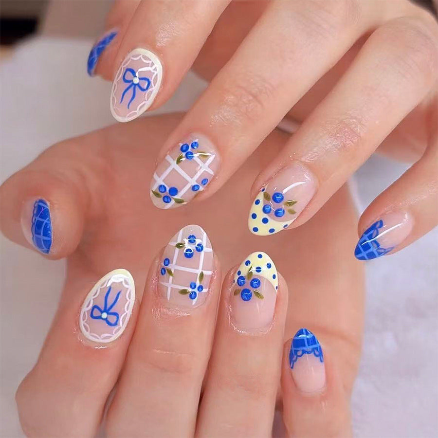 Blue Floral Elegance Long Almond Press On Nail Set with Intricate Design