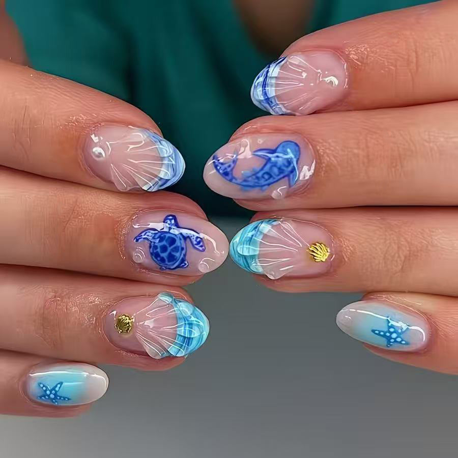 Ocean Breeze Medium Almond Blue Beach Theme Press On Nail Set with Unique Shell Designs