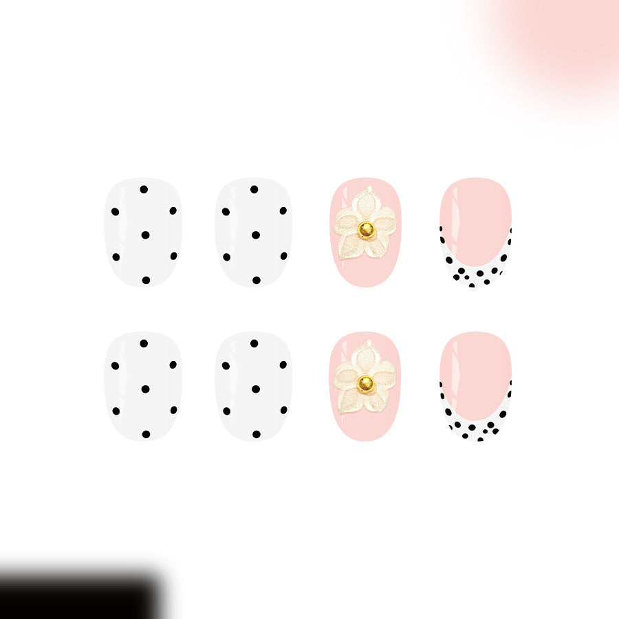 Chic Floral Inspiration Medium Oval White with Black Dots and Elegant Flower Accent Press on Nail Set