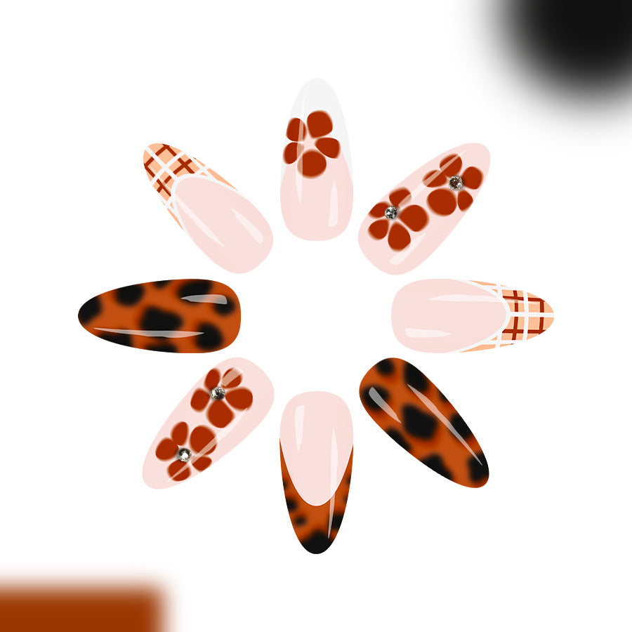 Wild Leopard Print Medium Almond Press-On Nail Set with Floral Accents and Sparkling Gems