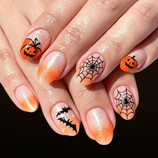 Spooktacular Short Oval Orange Press On Nail Set with Halloween Themed Designs