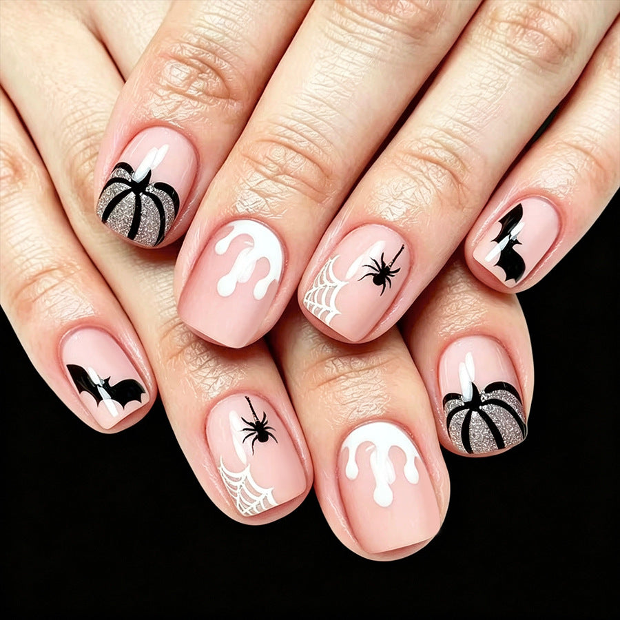 Spooky Elegance Short Square Beige Press On Nail Set with Halloween Themed Spider and Bat Designs