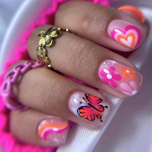 Playful Spring Short Round Sheer Pink with Heart and Butterfly Accents Press On Nail Set