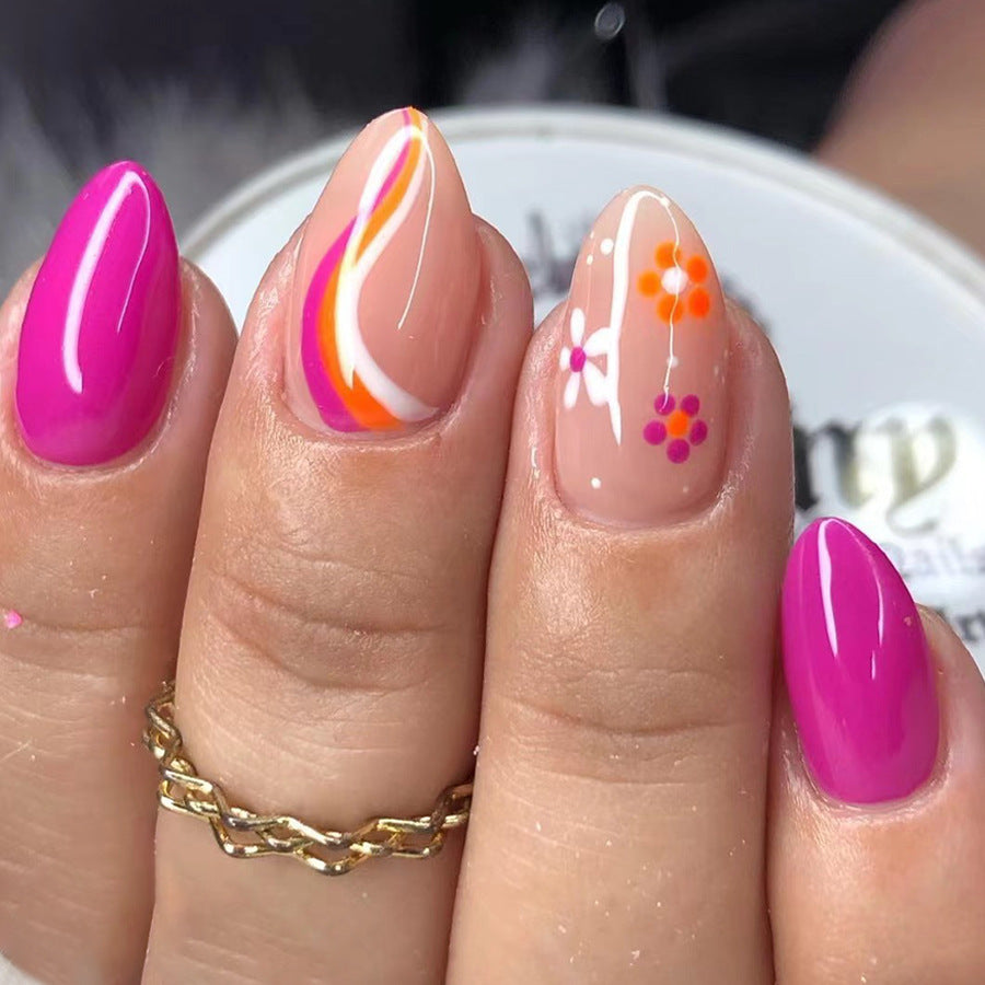 Vibrant Vibe Medium Almond Press On Nails in Hot Pink and Sheer Beige with Abstract Swirls and Floral Accents