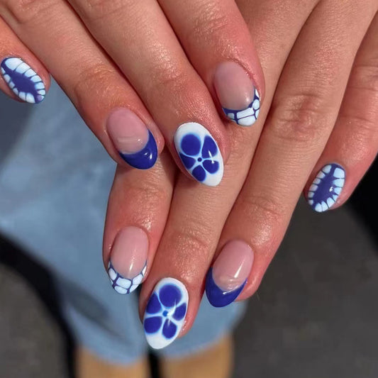 Coastal Charm Short Round Press On Nails in Sheer Beige with Nautical Blue Accents and Seashell Designs