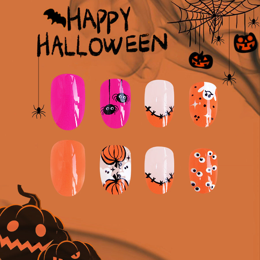 Spooky Elegance Medium Oval Press On Nail Set in Pink, White, Orange with Halloween Theme Art Design