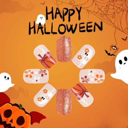 Spooky Elegance Medium Square Orange Glitter and Patterned Press On Nail Set Perfect for Halloween Festivities