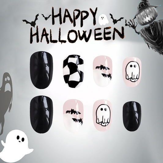 Spooky Elegance Medium Oval Black and White Halloween Ghosts and Bats Press On Nail Set with Whimsical Designs