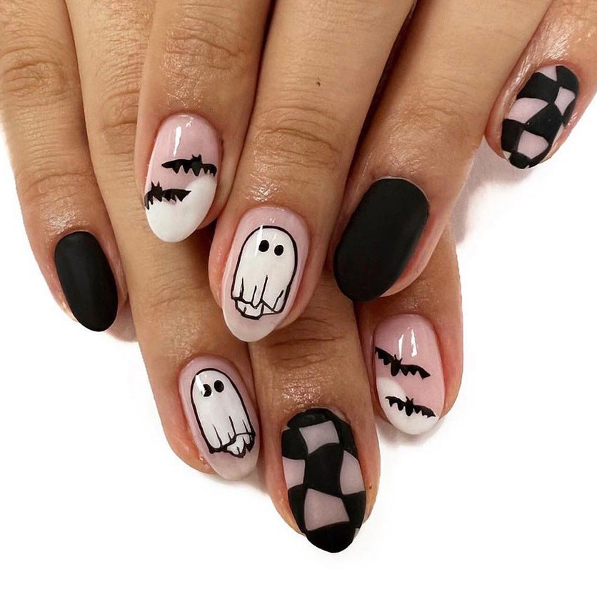 Spooky Elegance Medium Length Oval Press On Nail Set in Black and Pink with Ghostly Accents