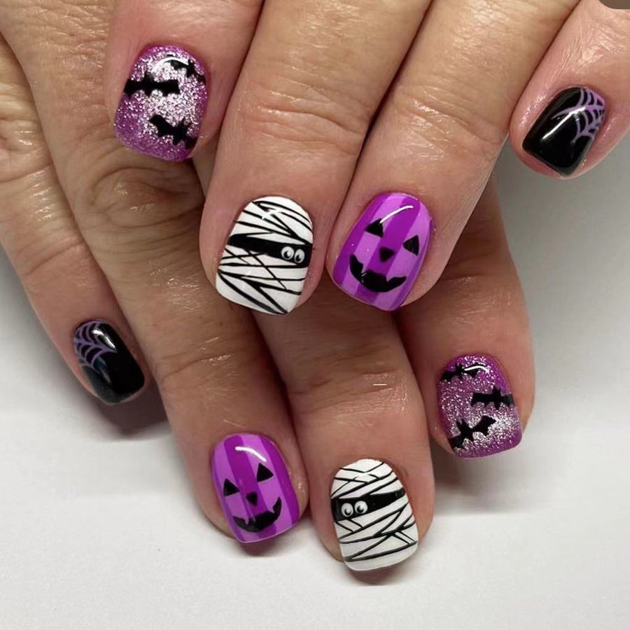 Spooky Elegance Short Square Purple & Black Halloween Themed Press On Nail Set with Glitter Accents and Pattern Variety
